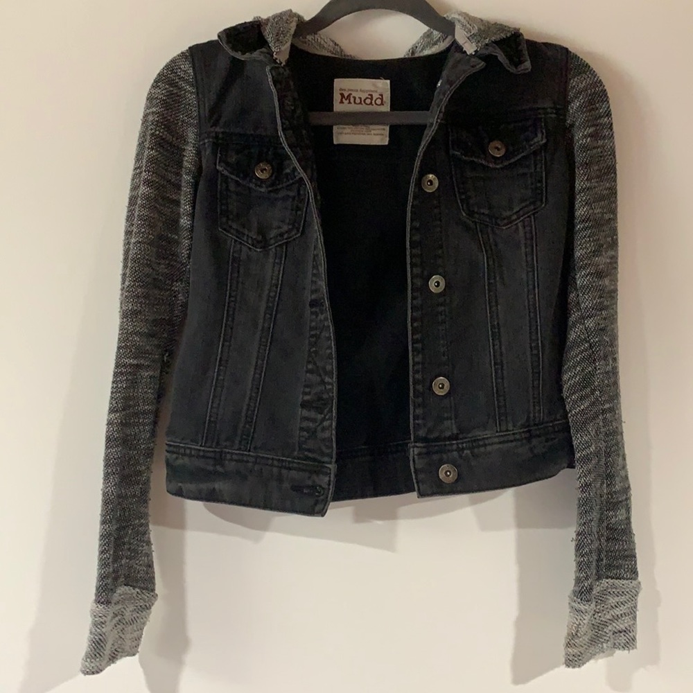 Black jean jacket with sweatshirt sleeves